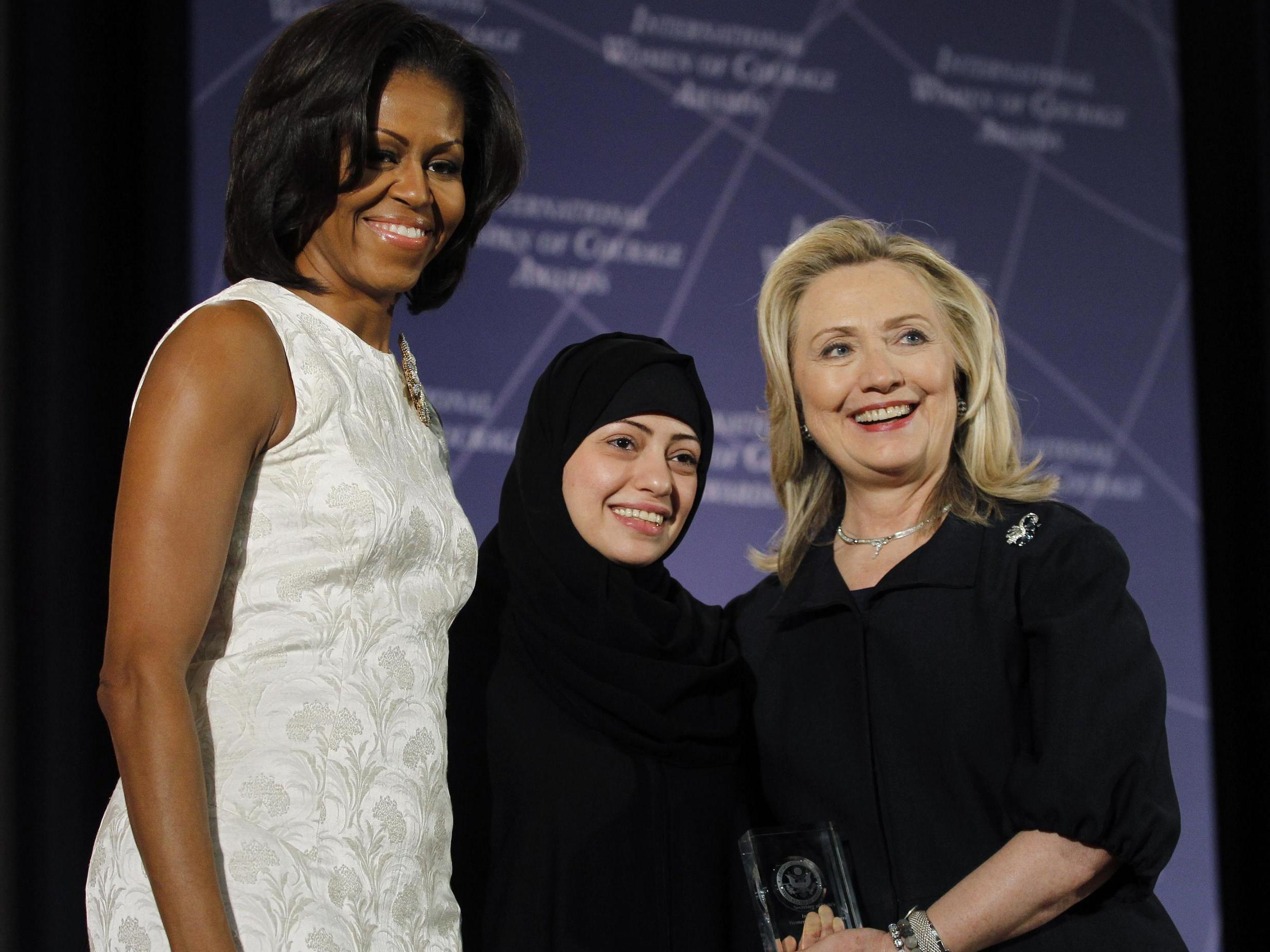 The move is in retaliation for criticism of the arrests of Saudi civil rights activists, including Samar Badawi, pictured above with Michelle Obama and Hillary Clinton