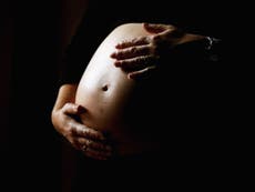 Inducing labour week before due date ‘cuts childbirth complications’