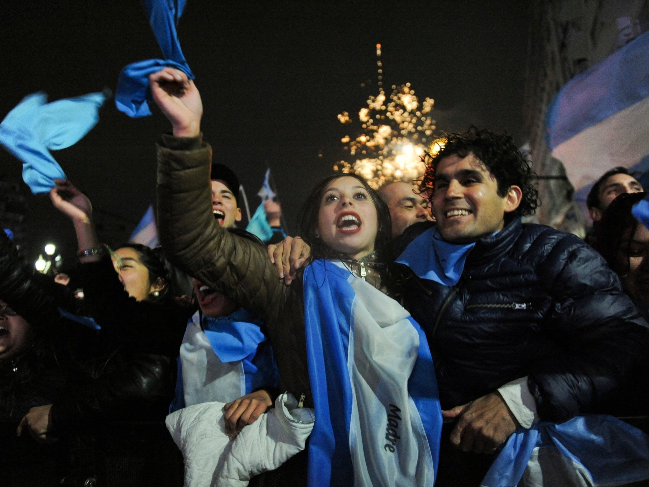 Demonstrators against decriminalising abortion celebrate outside Congress in Buenos Aires
