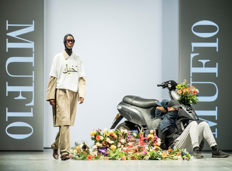 Iranian-born Danish designer Reza Etamadi features models wearing niqabs and hijabs on catwalk at Copenhagen Fashion Week