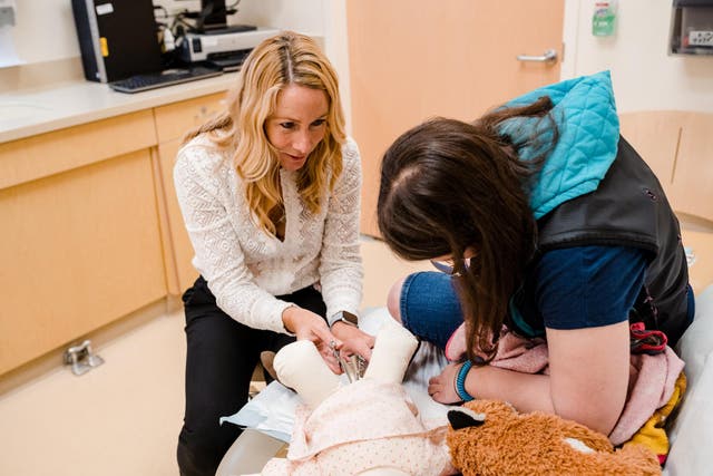 At a clinic in Michigan, doctors use dolls to explain gynecological exams to women with autism