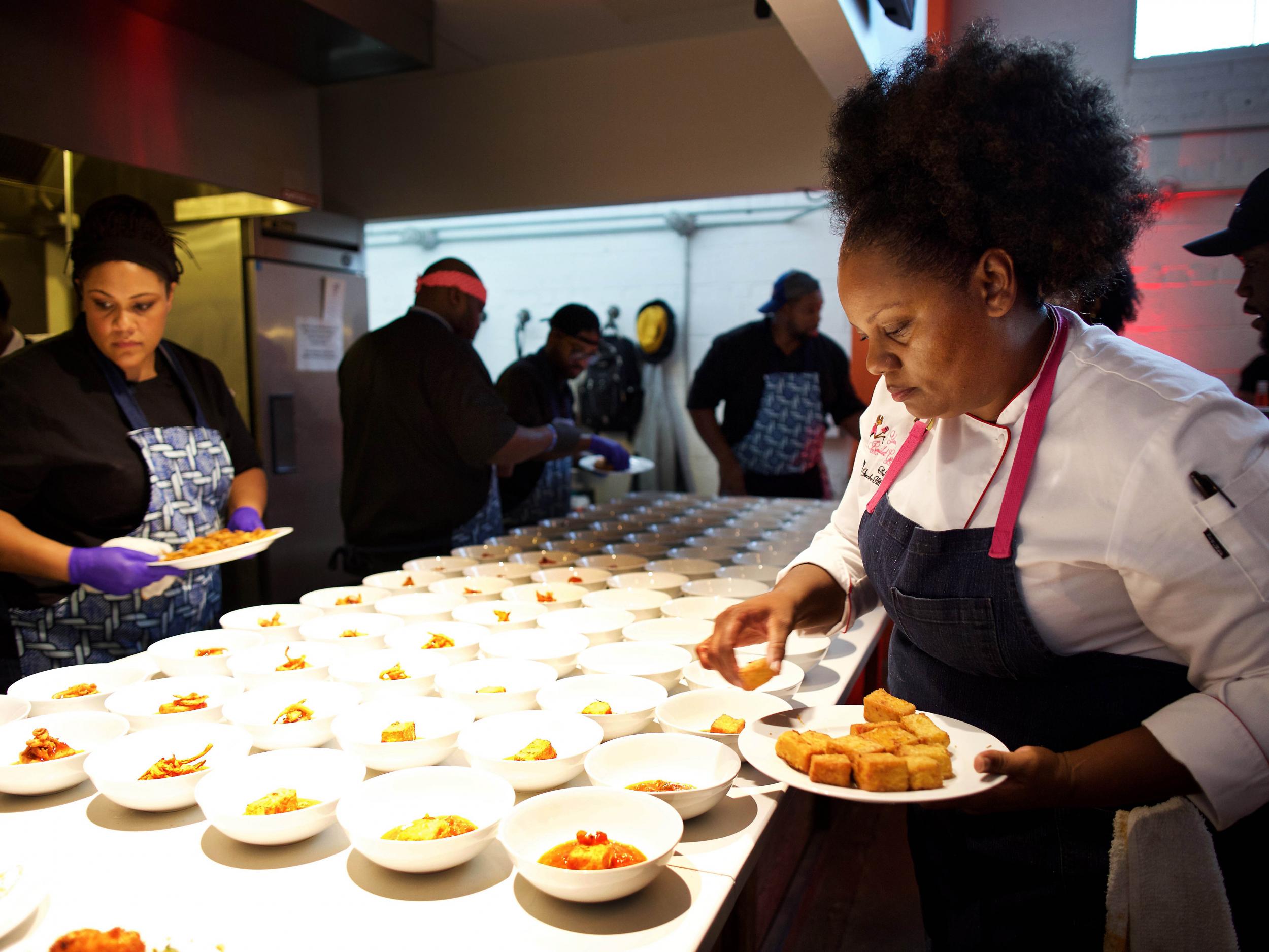 Jennifer Hill Booker puts the finishing touches on her vegetable course