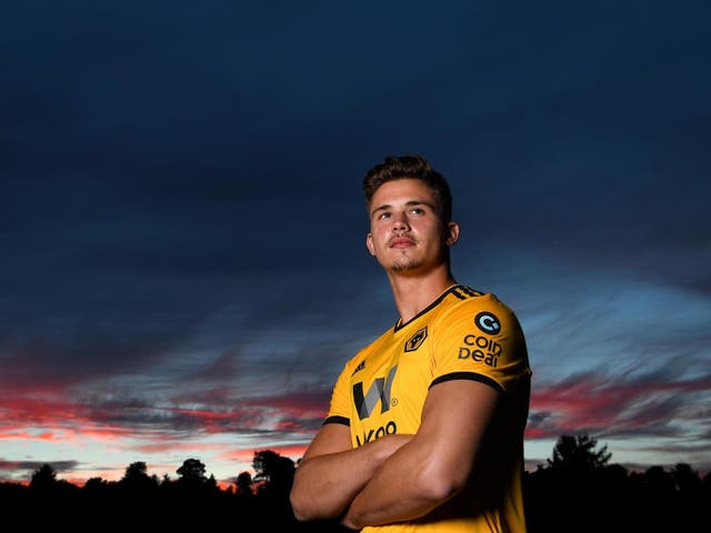 Leander Dendoncker poses at Wolves’ training ground on Thursday