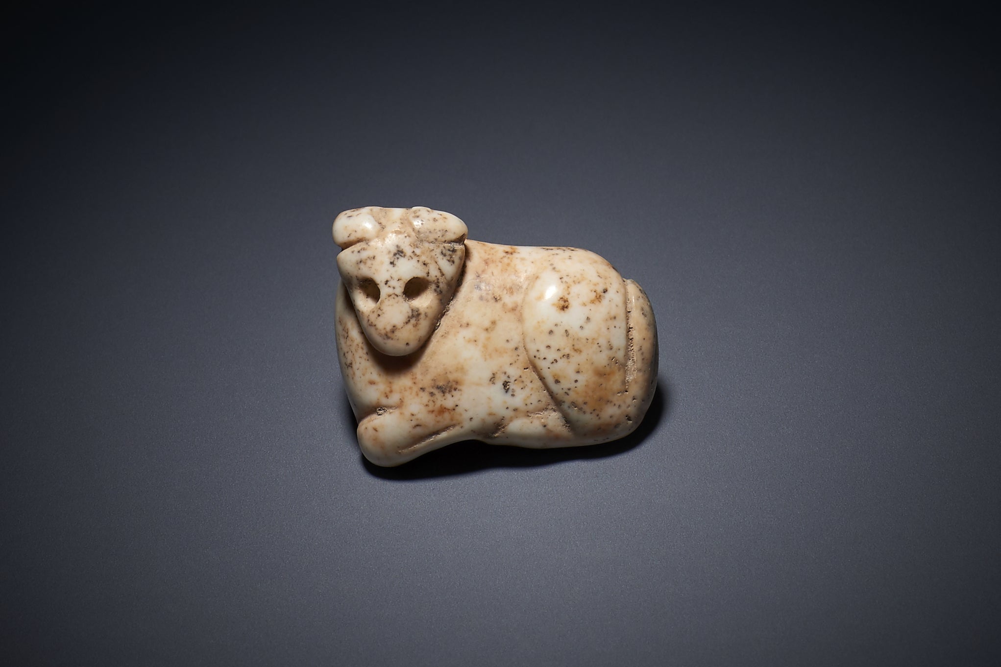 This white marble amulet is believed to have been crafted during the Jemdet Nasr period around 3000 BC