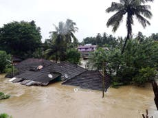 Floods and landslides kill 26 in India after torrential monsoon rains