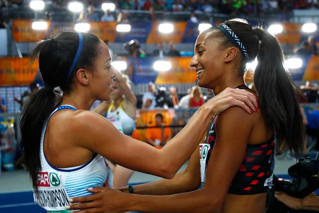 Katarina Johnson-Thompson congratulates gold medallist Nafi Thiam