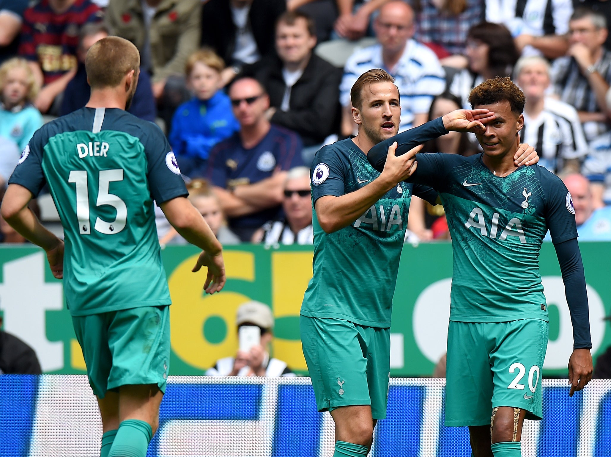 Dele Alli is congratulated after his winning goal
