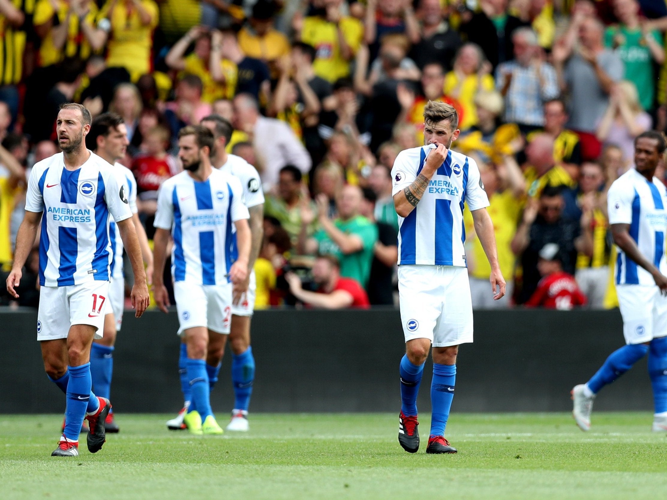 Brighton players react to going a goal down against Watford