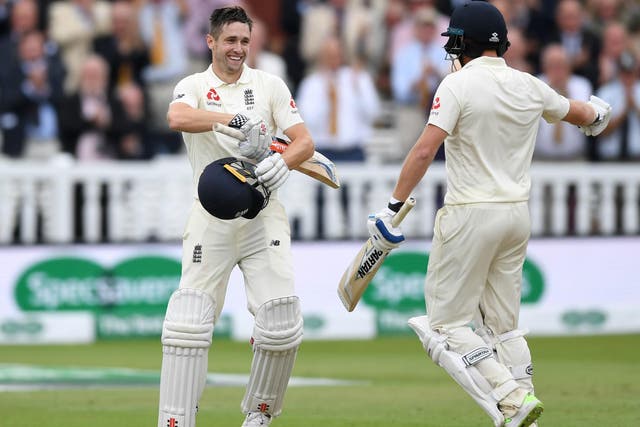 Chris Woakes celebrates after reaching his century for England on Saturday