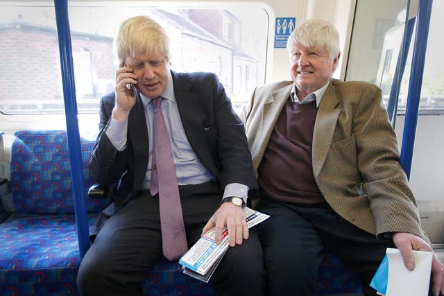 Stanley Johnson (right) has defended his son Boris over comments he made about full-face veils