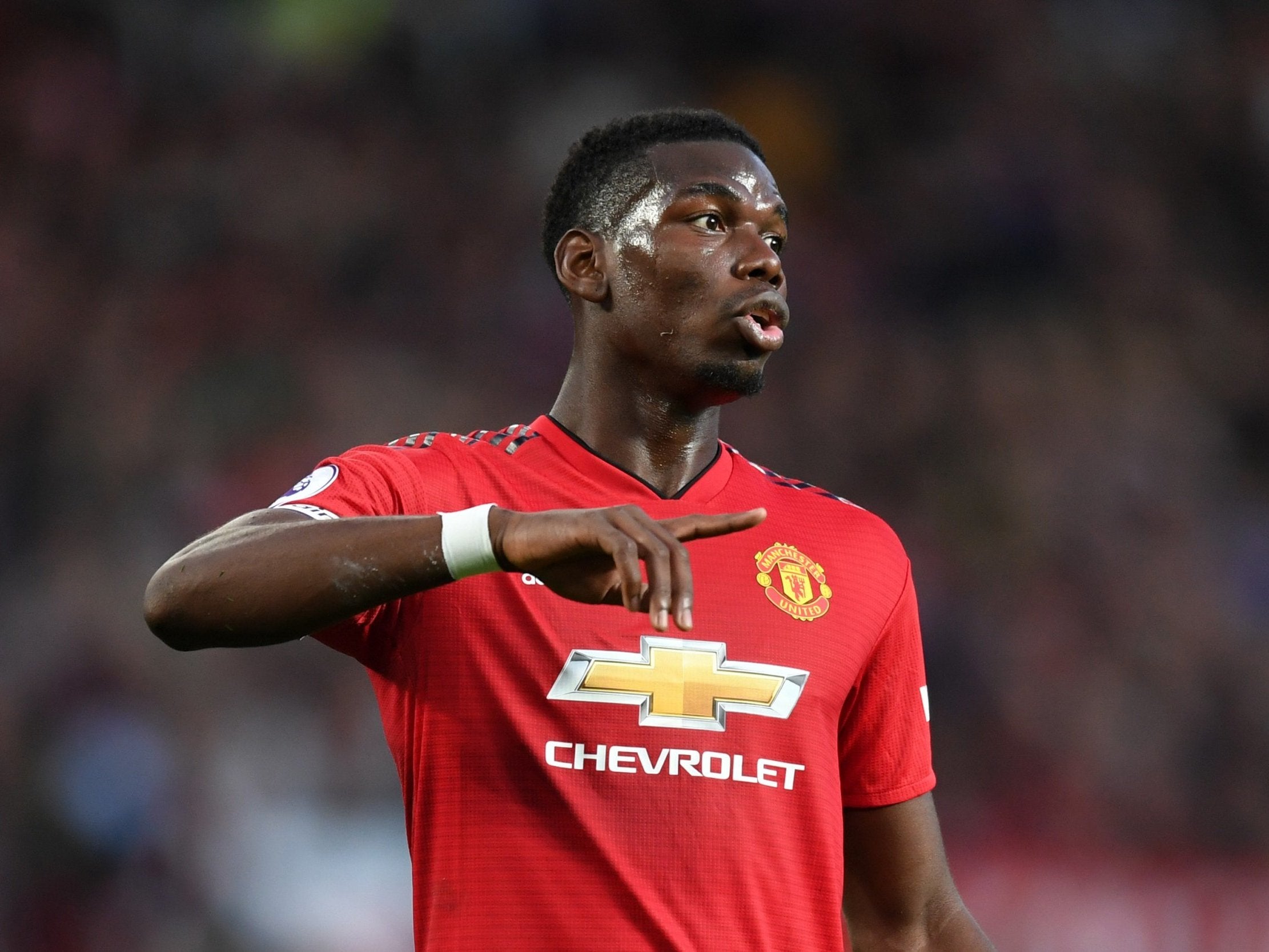 Paul Pogba transfer news: Man Utd star plays down reports of Barcelona move