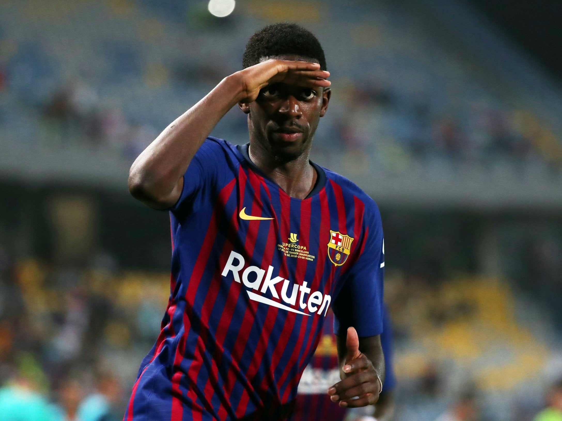 Ousmane Dembele celebrates after scoring the winning goal for Barcelona in the Spanish Super Cup