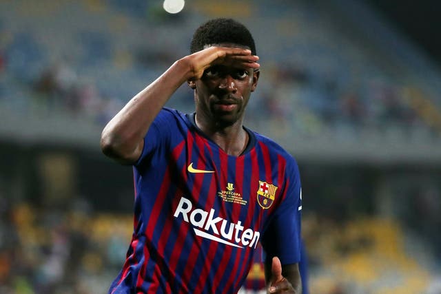 Ousmane Dembele celebrates after scoring the winning goal for Barcelona in the Spanish Super Cup