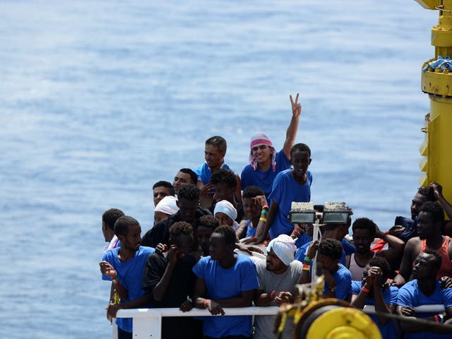 Migrants on board the MV Aquarius rescue ship after being rescued by the boat