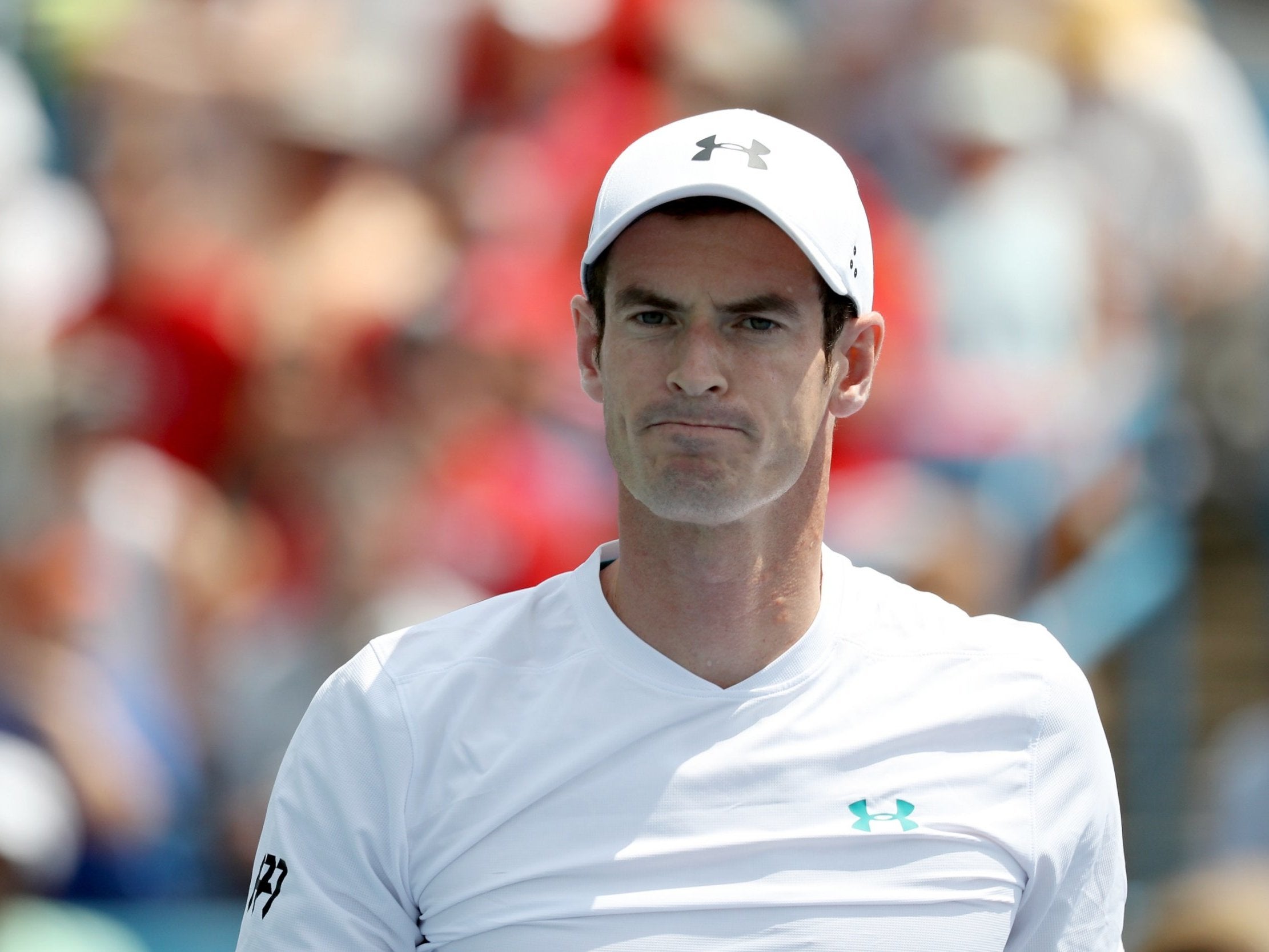 Andy Murray grimaces during his defeat by Lucas Pouille