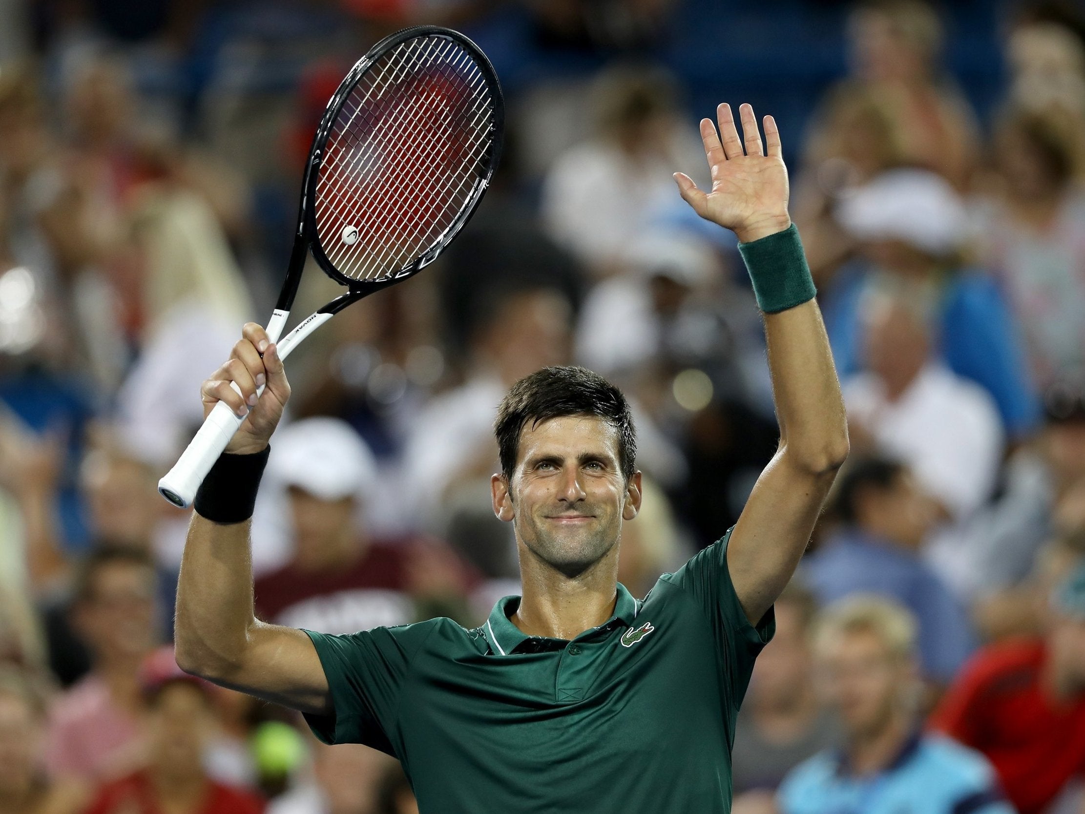 Novak Djokovic celebrates his victory over Steve Johnson