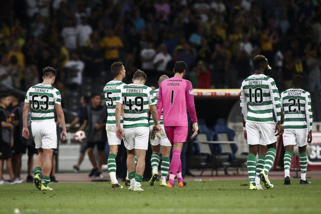 Celtic's players react after the final whistle