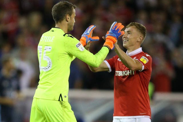 Nottingham Forest's Luke Steele celebrates with Ben Osborn after their victory over Bury