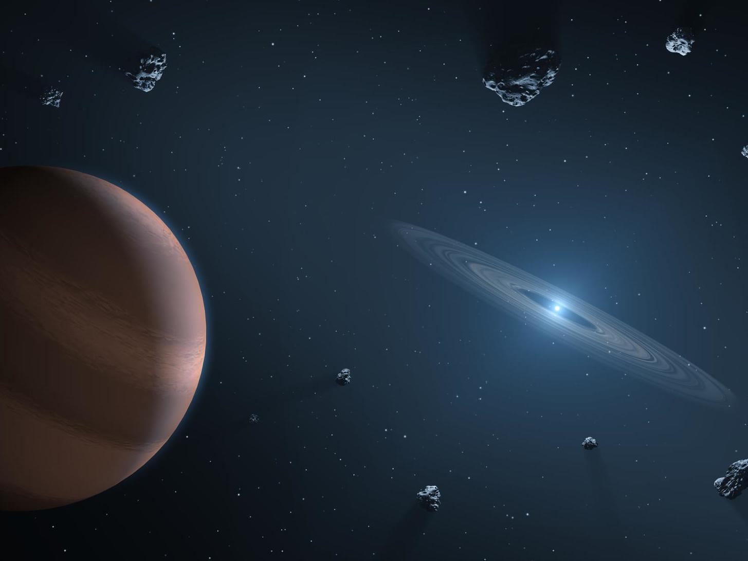 Artists impression of white dwarf star (on right) showing dust disc, and surrounding planetary bodies