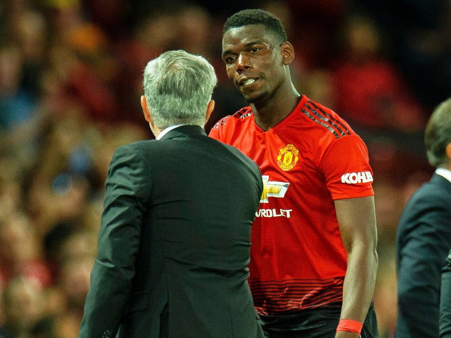 José Mourinho y Paul Pogba 