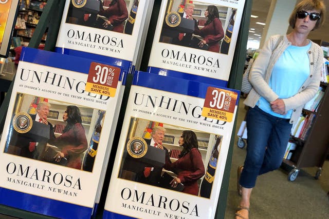 A new book by Omarosa Manigault Newman, 'Unhinged: An Insider's Account of the Trump White House', is displayed on a shelf at a Barnes and Noble store on August 14, 2018