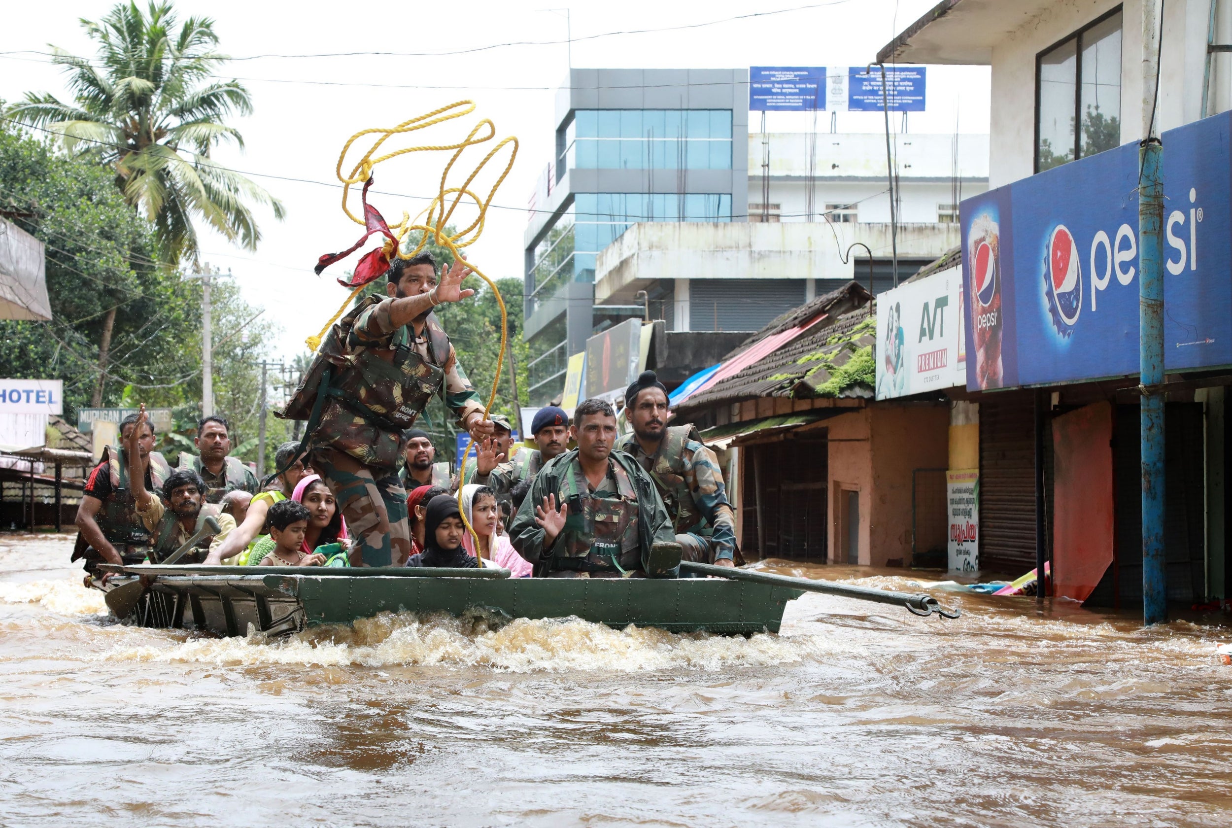 Indian army personnel evacuate residents