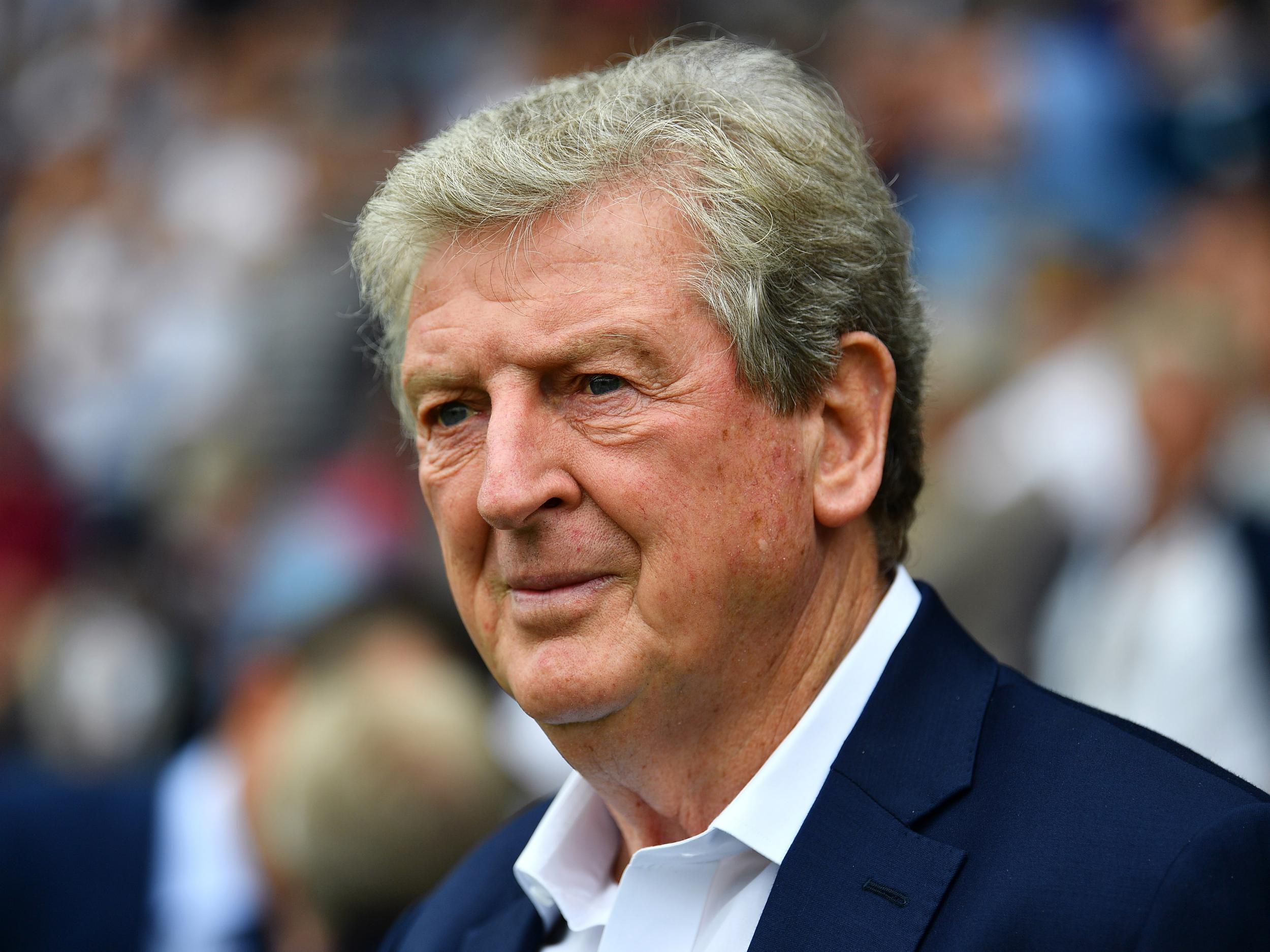 Hodgson was keen for Zaha to sign a new deal