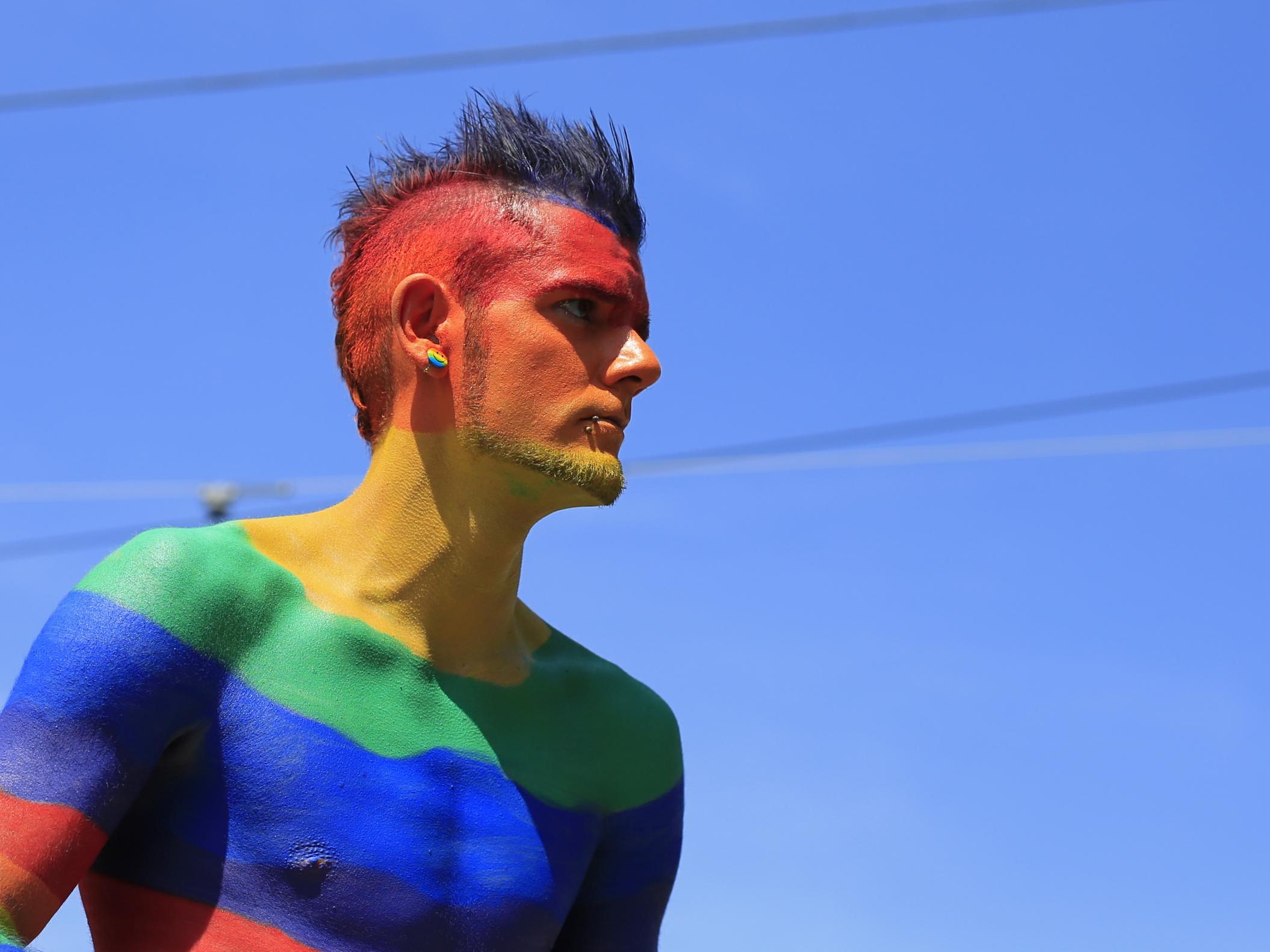 A participant attends the Rainbow Parade march, bringing together lesbian, gay, bisexual, transgender and transsexual people, on June 15, 2013 in Vienna