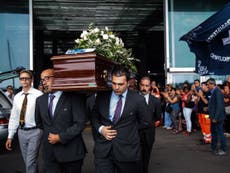 Families jeer Italian politicians funeral at state funeral for victims