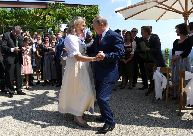 <p>File. Austria’s ex foreign minister Karin Kneissl seen dancing with Russia’s president Vladimir Putin at her wedding in Gamlitz, Austria, 18 August 2018</p>