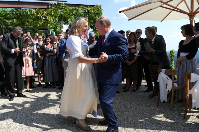 <p>File. Austria’s ex foreign minister Karin Kneissl seen dancing with Russia’s president Vladimir Putin at her wedding in Gamlitz, Austria, 18 August 2018</p>