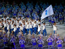 Unified Korean athletes parade together at Asian Games ceremony
