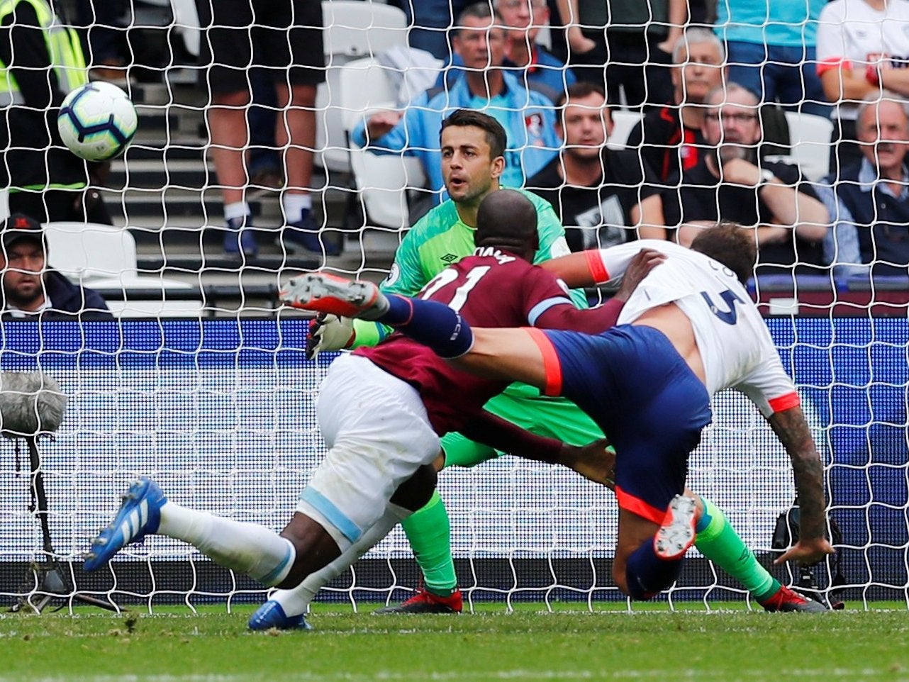 Steve Cook bundles the ball over the line to put the Cherries ahead