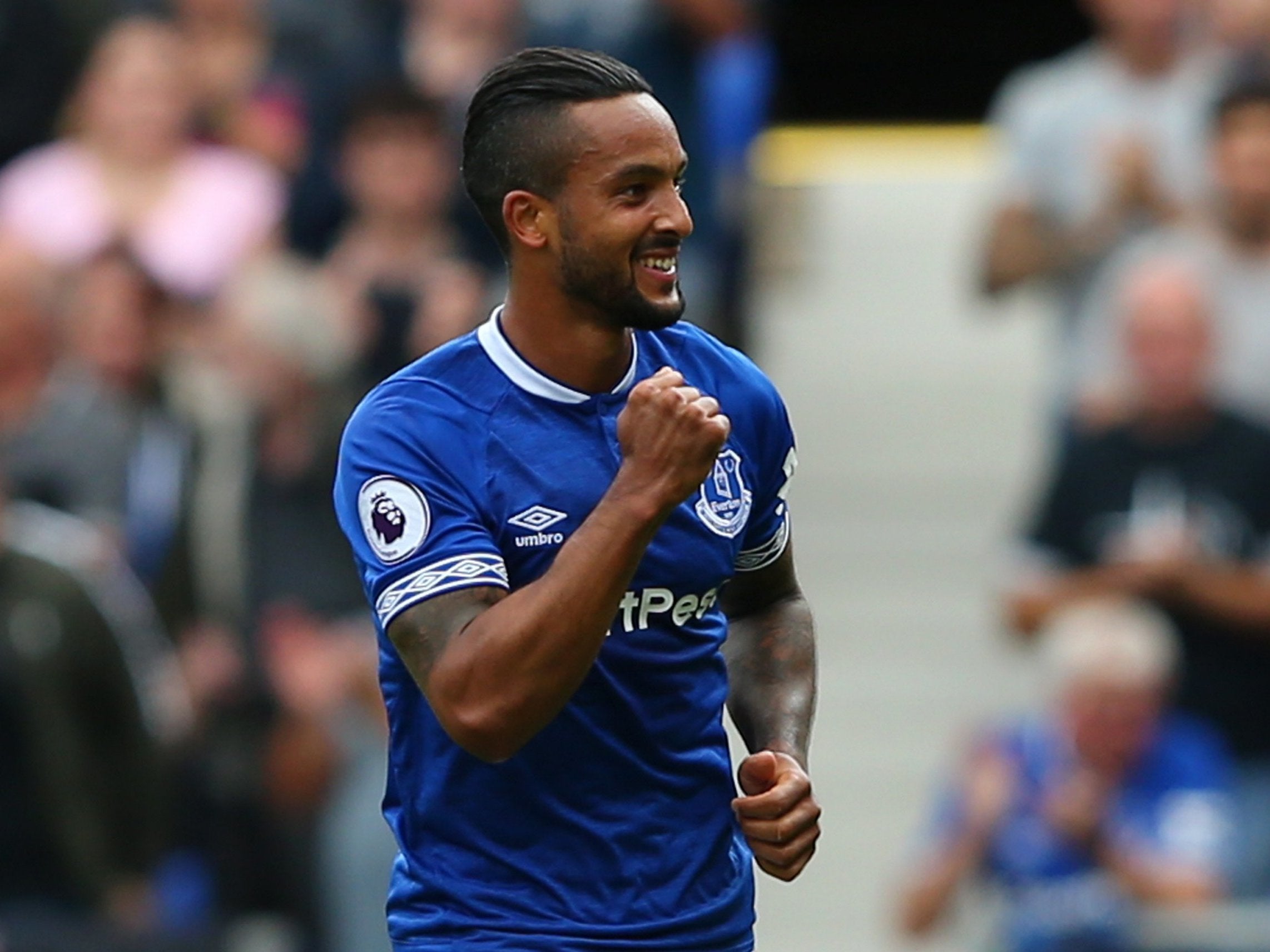 Theo Walcott opened the scoring for Everton as they handed manager Marco Silva his first win