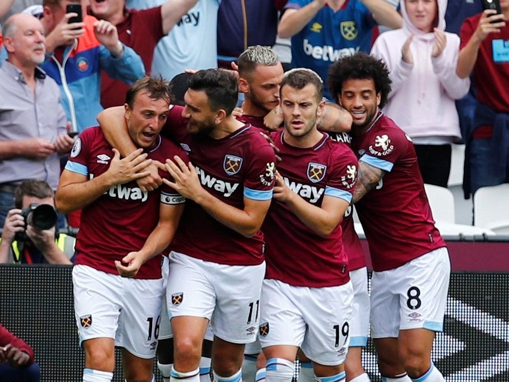 West Ham players celebrate Marko Arnautovic's penalty decision