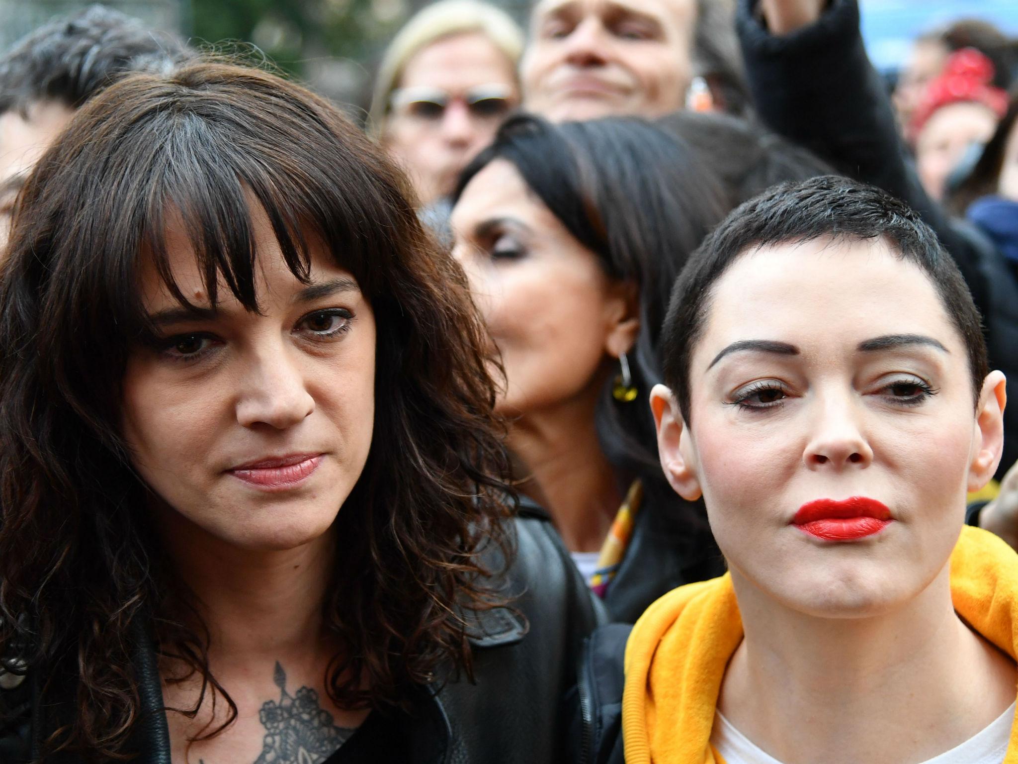 Asia Argento and Rose McGowan taking part in a MeToo march as part of International Women's Day in Rome in 2018