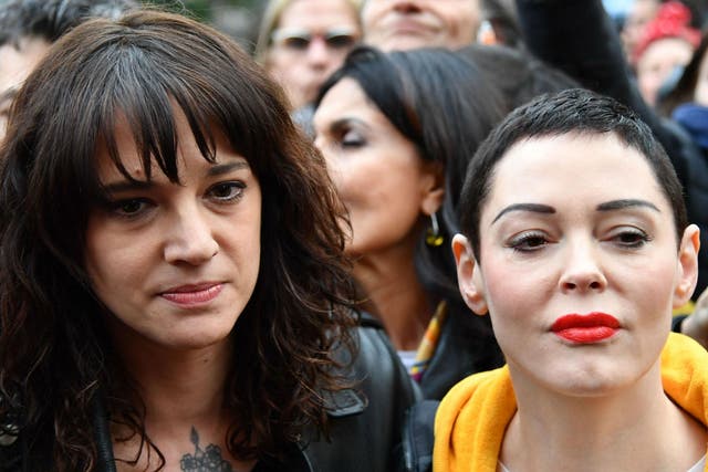 Asia Argento and Rose McGowan taking part in a MeToo march as part of International Women's Day in Rome in 2018