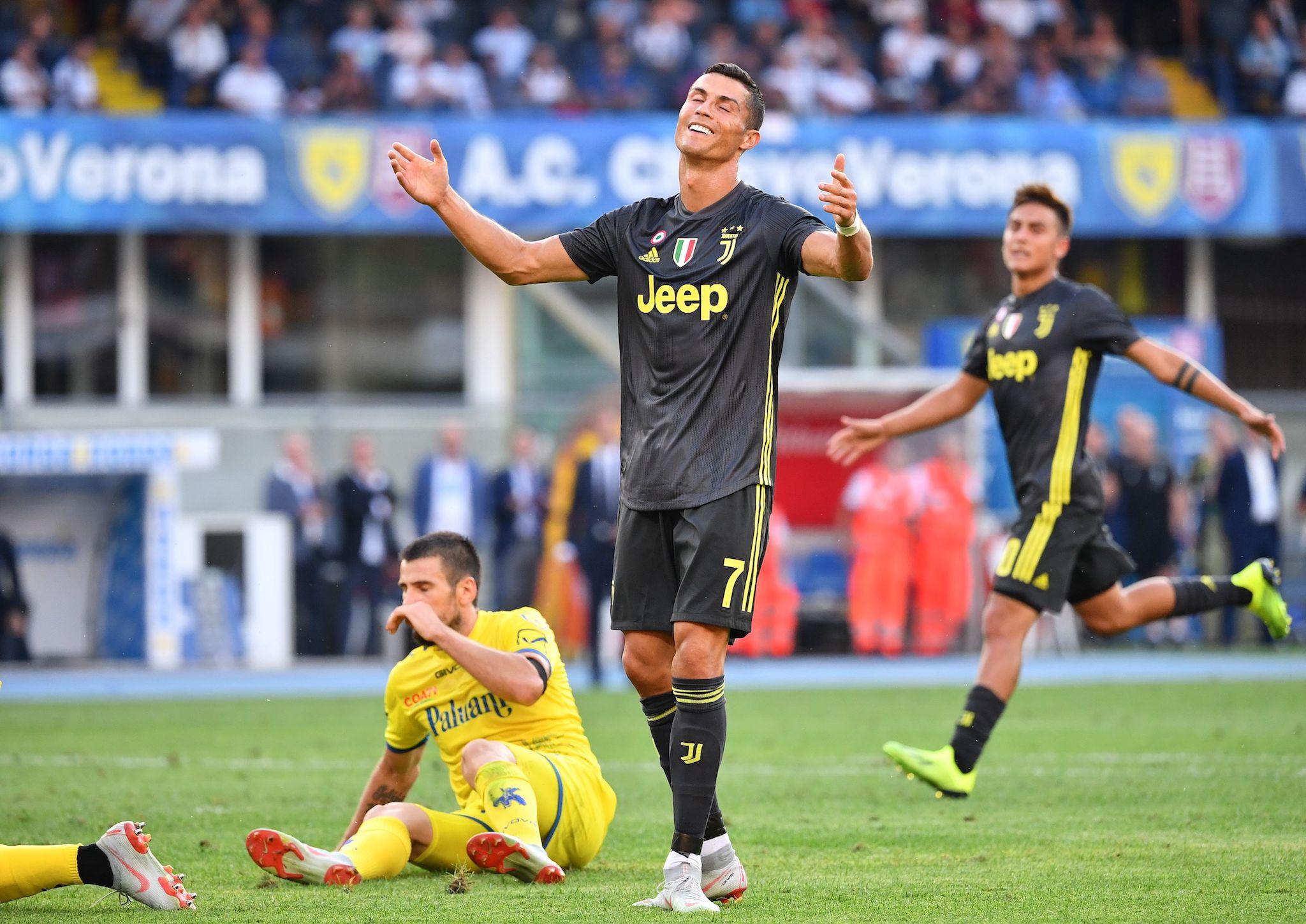 Juventus' Portuguese forward Cristiano Ronaldo reacts after missing a shot during the Italian Serie A football match AC Chievo vs Juventus at the Marcantonio-Bentegodi stadium in Verona on August 18, 2018