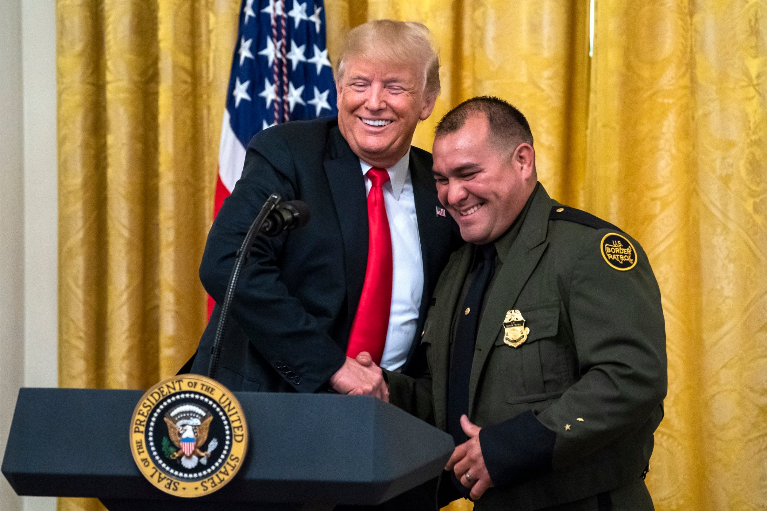 Mr Trump called a Border Patrol agent up to speak during his White House event