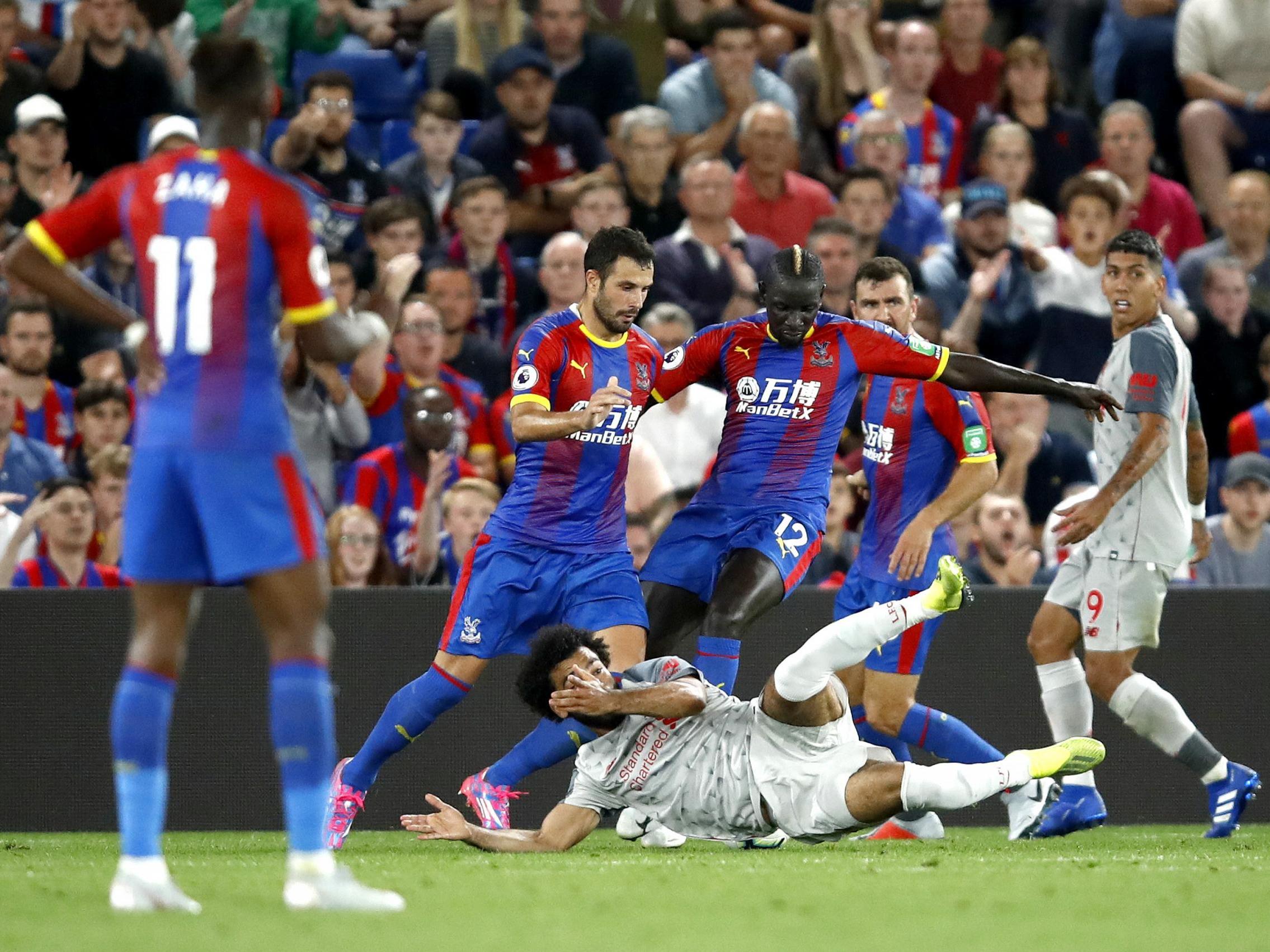 Mohamed Salah goes to deck after his run-in with Mamadou Sakho