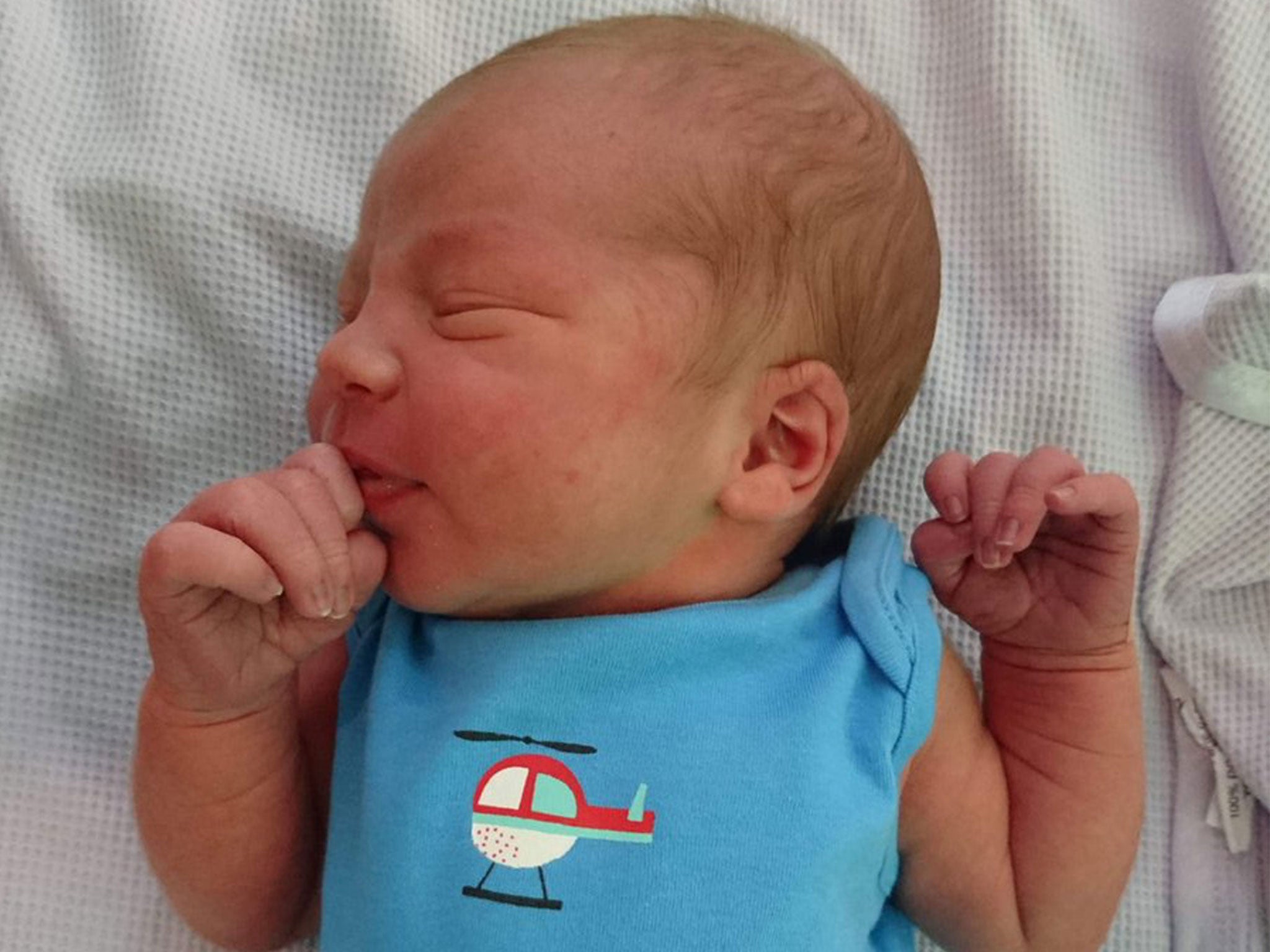 Baby Torran MacDonald was born around 1,400 feet above Cornwall on a coastguard helicopter