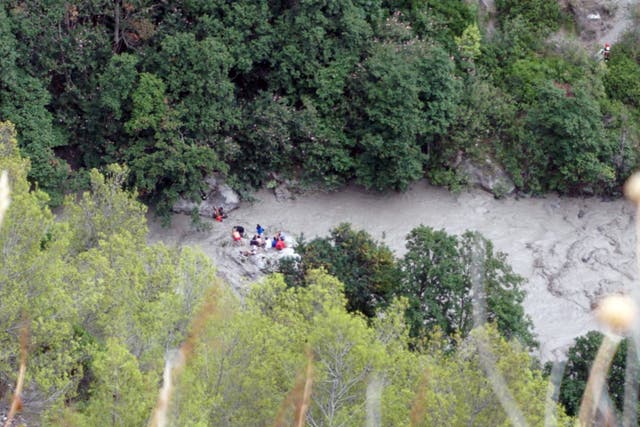 Rescuers conduct recovery operations in the Raganello Gorge in Civita, southern Italy
