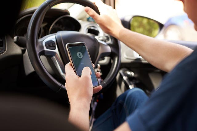 Nearly a third of drivers confessed to checking their mobile phone when behind the wheel