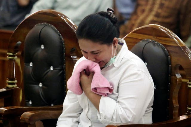Meiliana wept as her sentence was read out at a district court in Medan, North Sumatra, Indonesia
