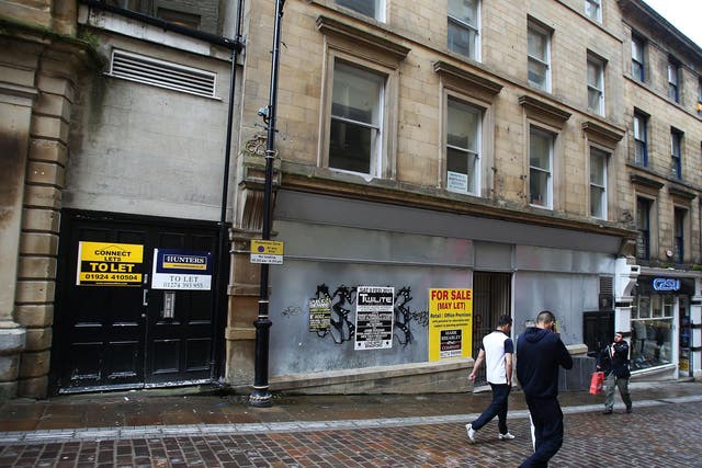 Boarded up shops are increasingly the norm on the British high street 