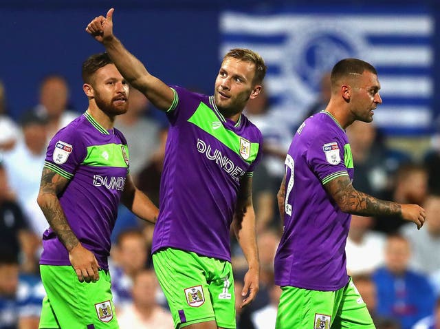 Andreas Weimann of Bristol City (center) celebrates after scoring