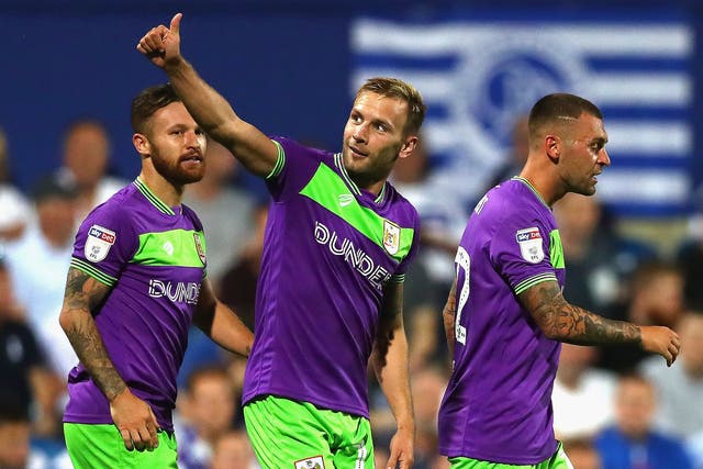Andreas Weimann of Bristol City (center) celebrates after scoring