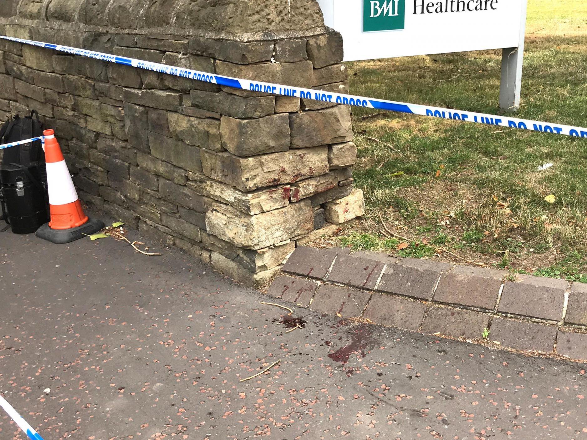 Blood was smeared on a door and on the pavement at the entrance to BMI The Huddersfield Hospital after a man was assaulted in a 'targeted attack' just after midnight on Wednesday