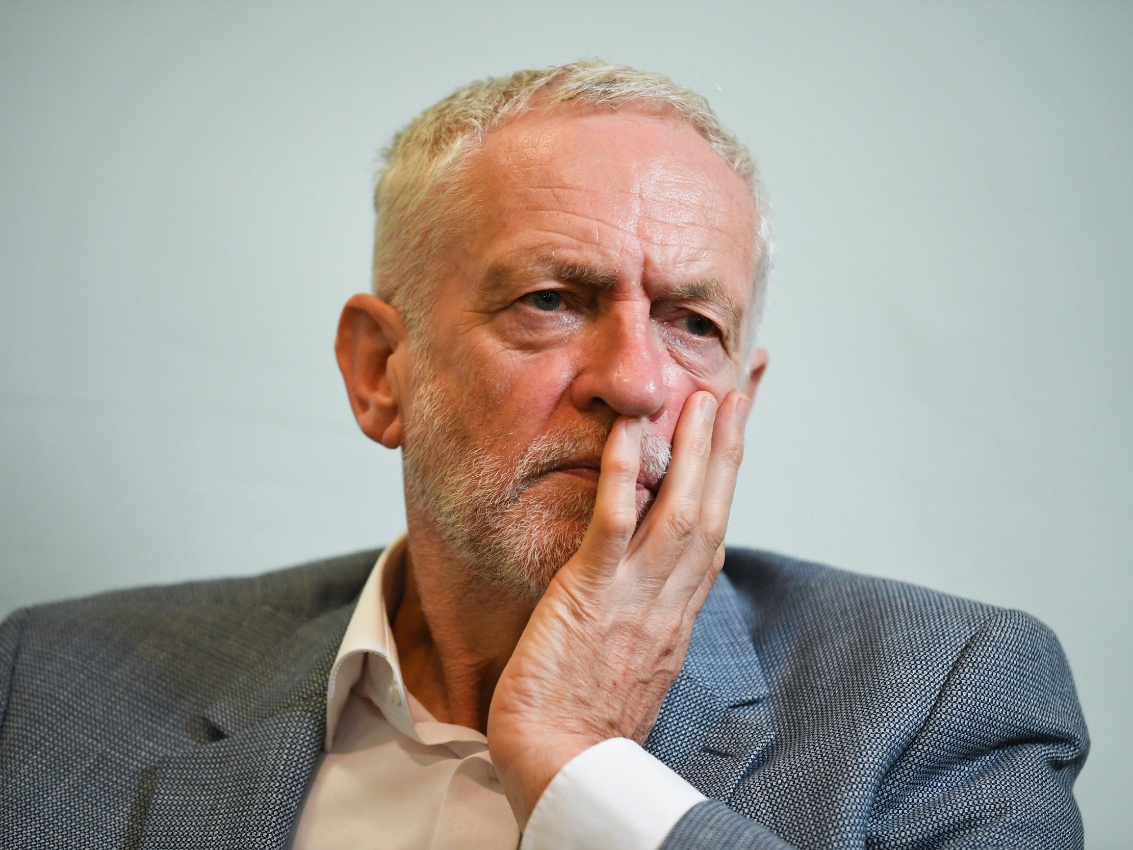 Labour leader Jeremy Corbyn meets with asylum seeker brothers Somer Umeed and Areeb Umeed at Possilpark Parish Church
