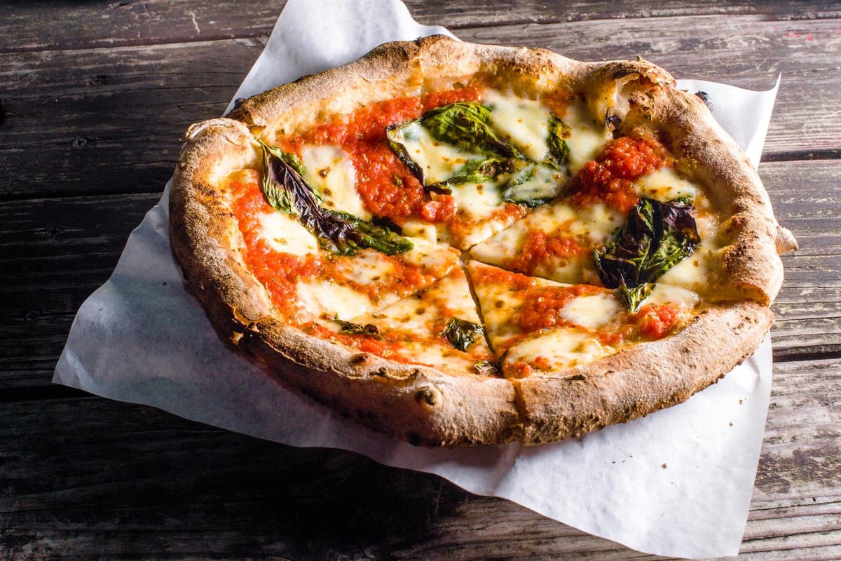 How many pizzas the average Brit eats in their lifetime, according to ...